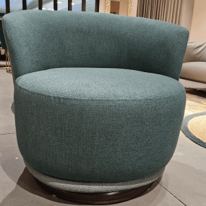 Luxurious modern chair with a vibrant turquoise upholstered seat sofa.